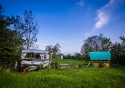 The Gypsy bow top and the Marshall showman's caravan together at sunset