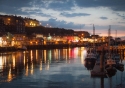 Whitby town and harbour at dusk